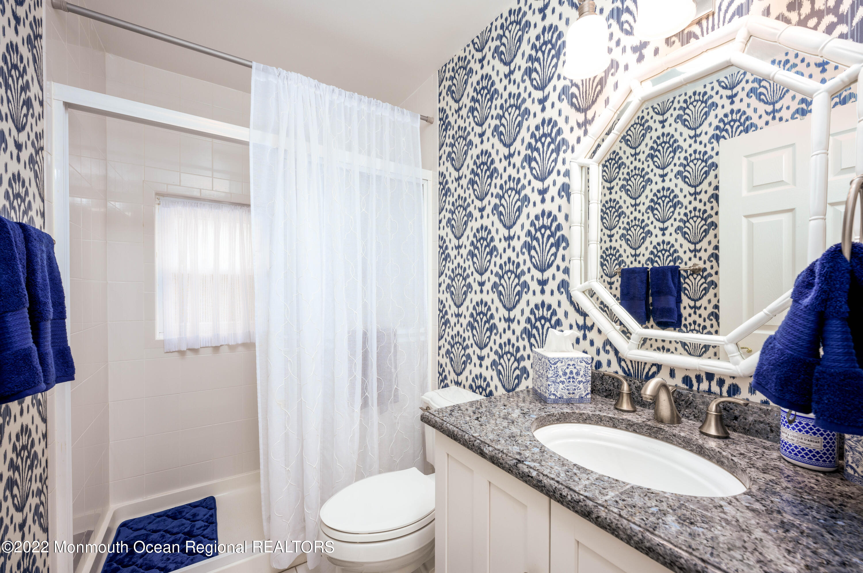 2002 Nassau Drive Spring Lake, NJ 07762 - Photo 7 of 43 a bathroom with a granite countertop sink mirror vanity and toilet