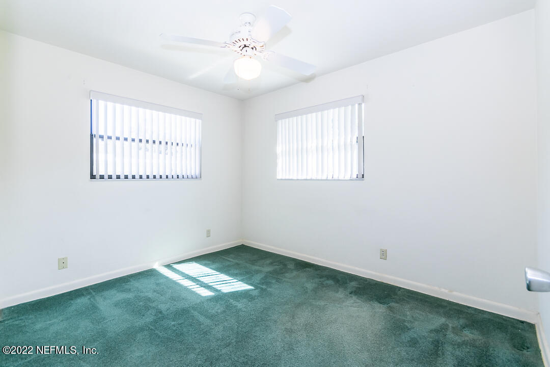 3846 Bess Road Jacksonville, FL 32277 - Photo 9 of 18 a view of an empty room with a window