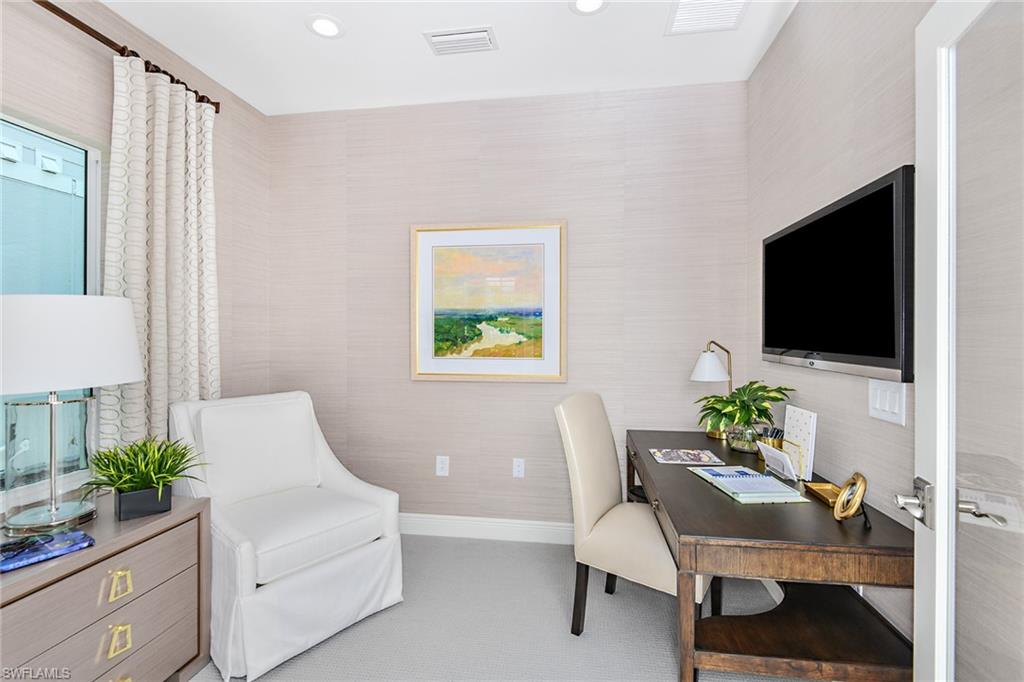 4621 Centaurus Circle Naples, FL 34120 - Photo 3 of 15 a living room with furniture and a flat screen tv