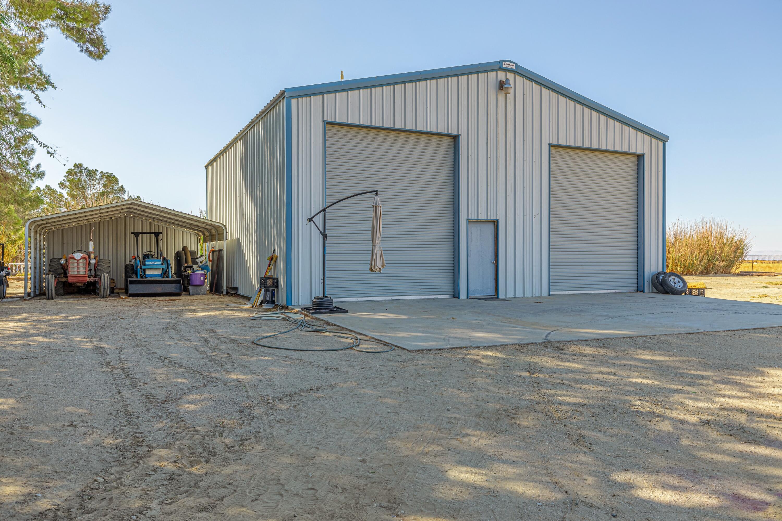 43233 55th Street East Lancaster, CA 93535 - Photo 43 of 46 a view of a house with a street