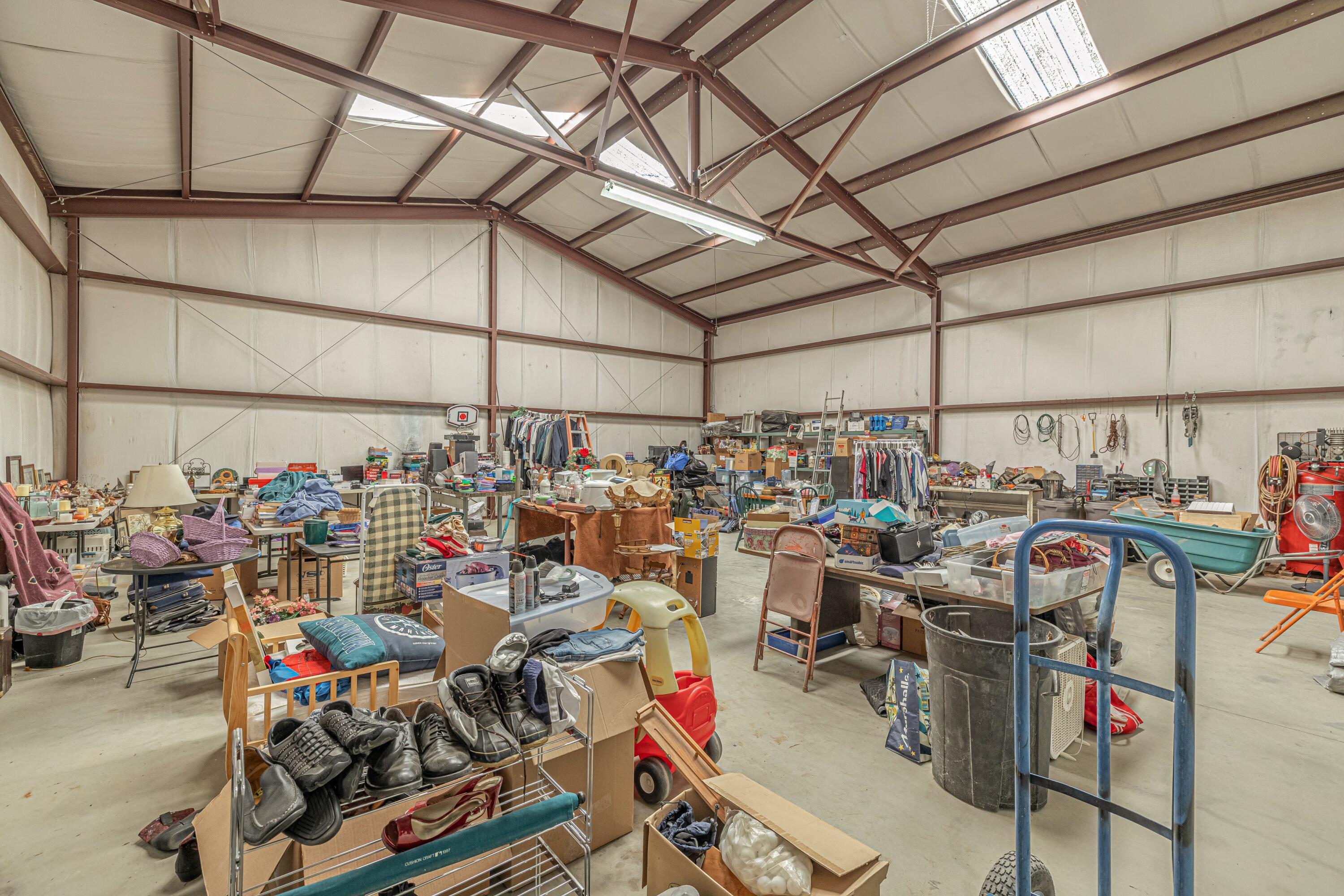 43233 55th Street East Lancaster, CA 93535 - Photo 45 of 46 a view of a storage room with a lot of stuff