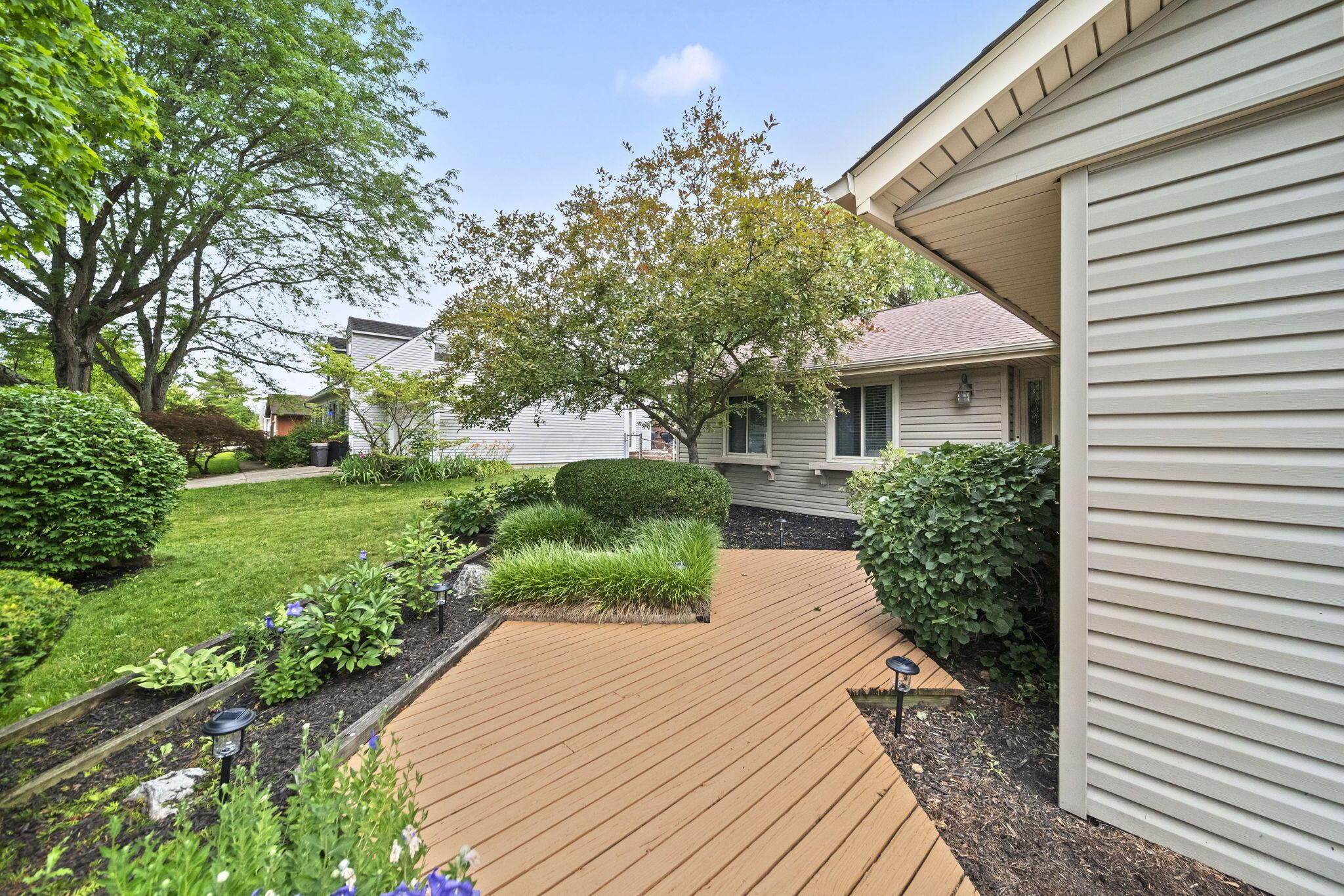 184 East Schrock Road Westerville, OH 43081 - Photo 5 of 61 Garden lined walkway with fountain leading to the front door.