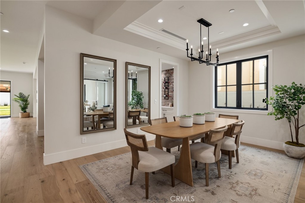 1820 9th Street Manhattan Beach, CA 90266 - Photo 13 of 75 a view of a dining room with furniture window and wooden floor