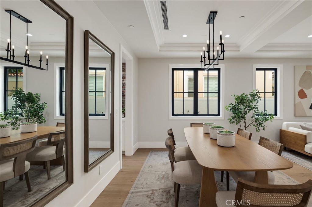 1820 9th Street Manhattan Beach, CA 90266 - Photo 14 of 75 a view of a dining room with furniture window and wooden floor