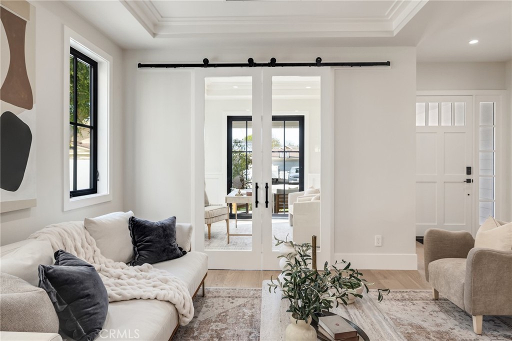 1820 9th Street Manhattan Beach, CA 90266 - Photo 15 of 75 a living room with furniture and a large window