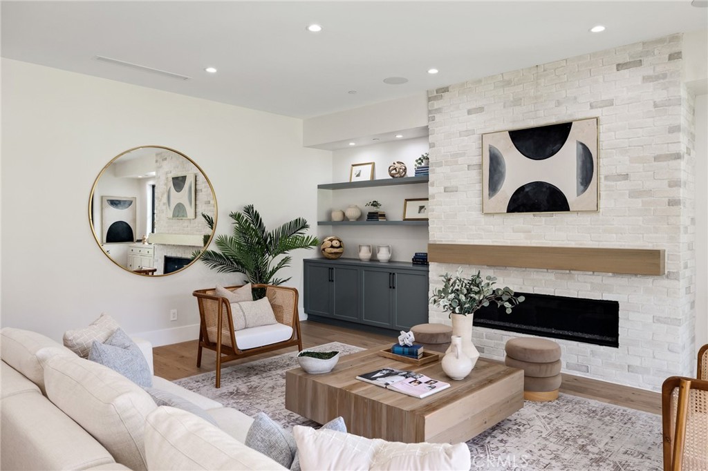 1820 9th Street Manhattan Beach, CA 90266 - Photo 40 of 75 a living room with furniture and a fireplace