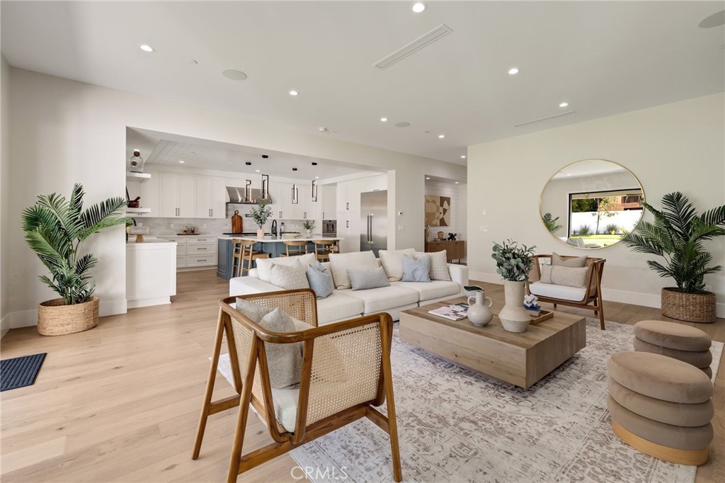 1820 9th Street Manhattan Beach, CA 90266 - Photo 47 of 75 a living room with furniture or kitchen view and a potted plant