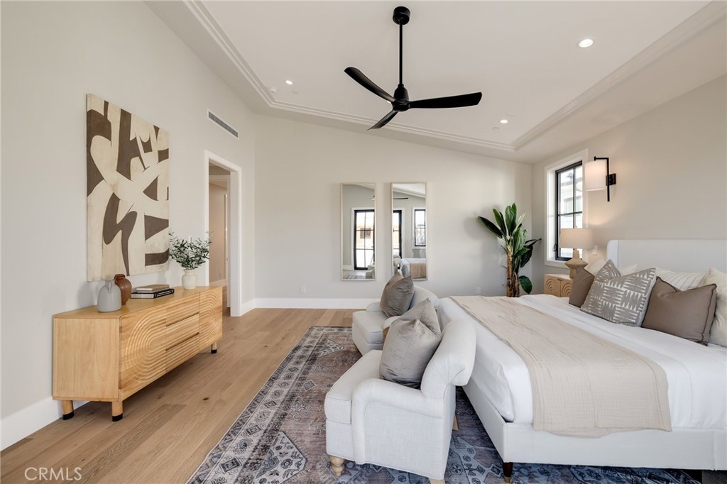1820 9th Street Manhattan Beach, CA 90266 - Photo 53 of 75 a bedroom with a large bed and a couch