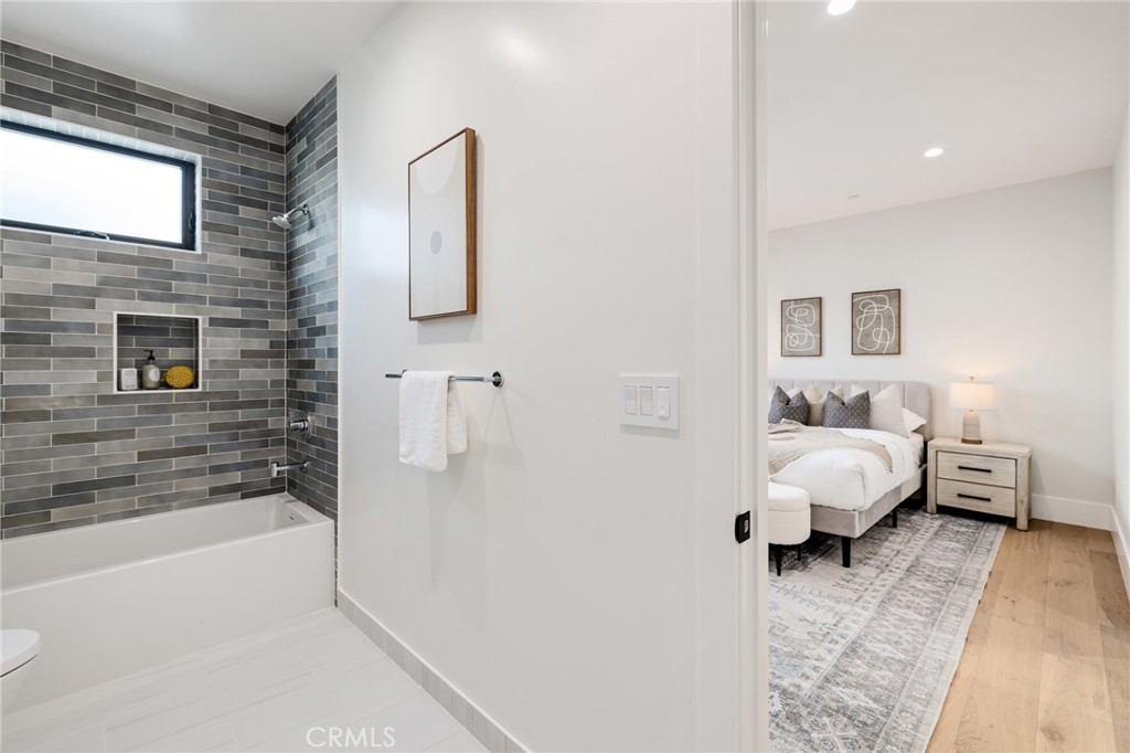 1820 9th Street Manhattan Beach, CA 90266 - Photo 66 of 75 a bathroom with a bathtub and a shower