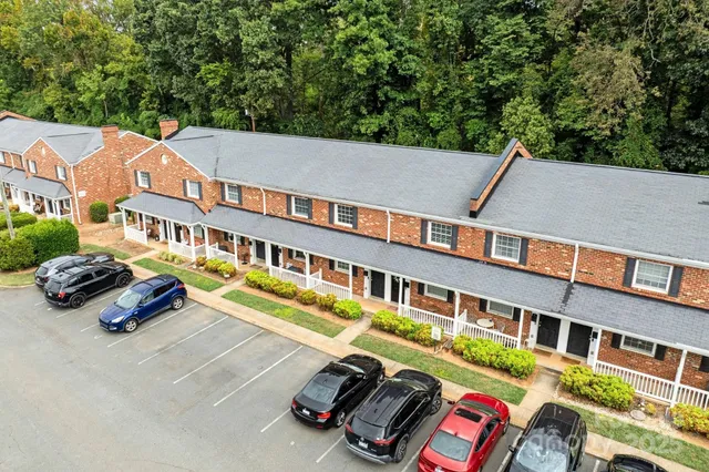 an aerial view of a house with swimming pool