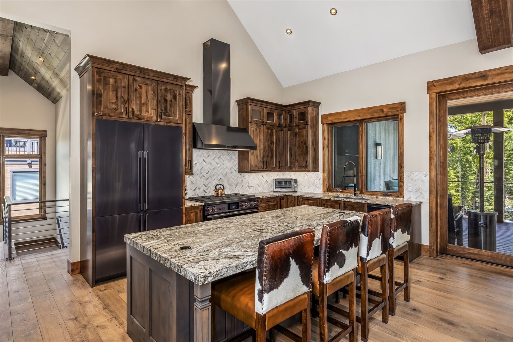 99 Independence Lane Keystone, CO 80435 - Photo 9 of 50 a kitchen that has a table and chairs in it