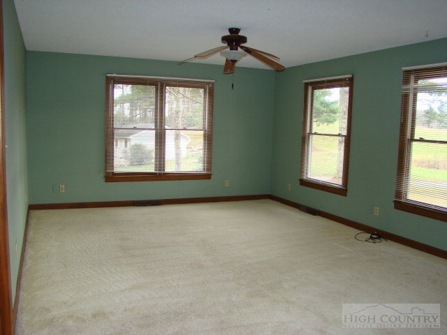 164 New Way Road Boone, NC 28607 - Photo 13 of 17 a view of an empty room with a window