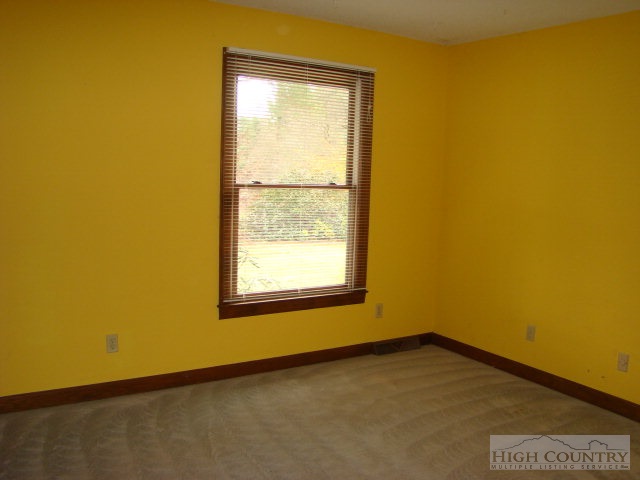 164 New Way Road Boone, NC 28607 - Photo 5 of 17 a view of an empty room with a window