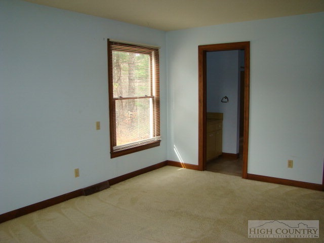 164 New Way Road Boone, NC 28607 - Photo 6 of 17 an empty room with windows