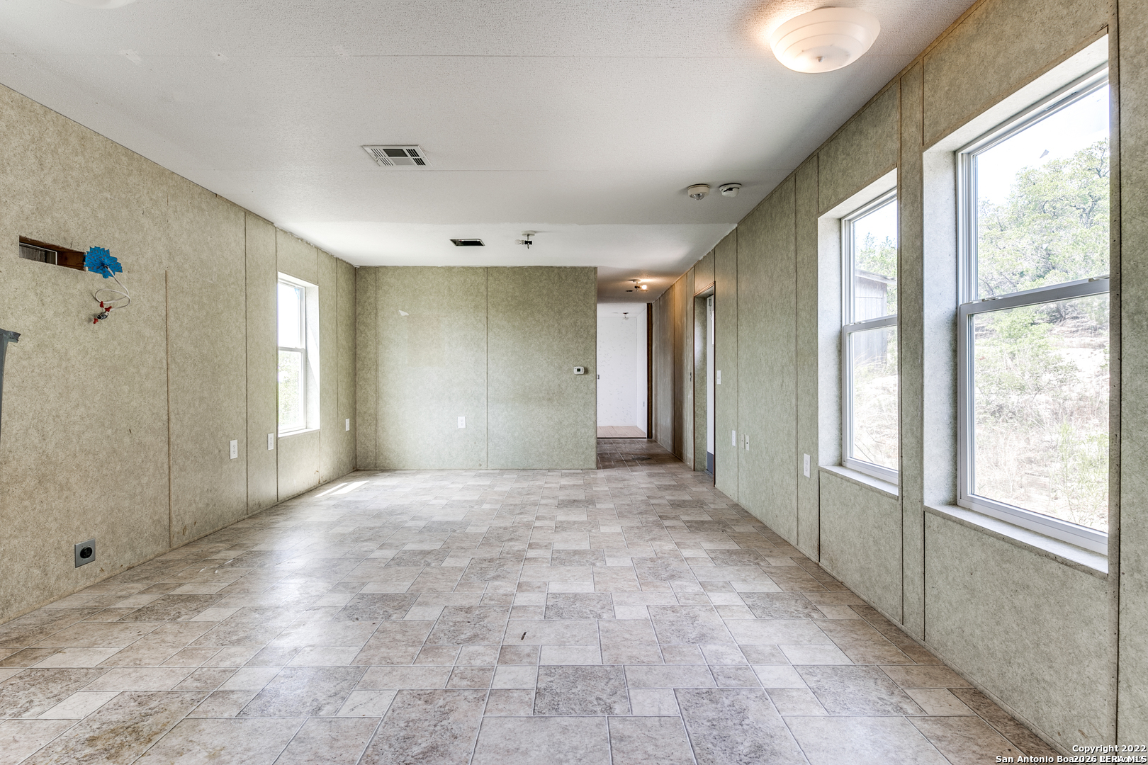 2844 Hidden Valley Road Pipe Creek, TX 78063 - Photo 15 of 30 a view of an empty room and window