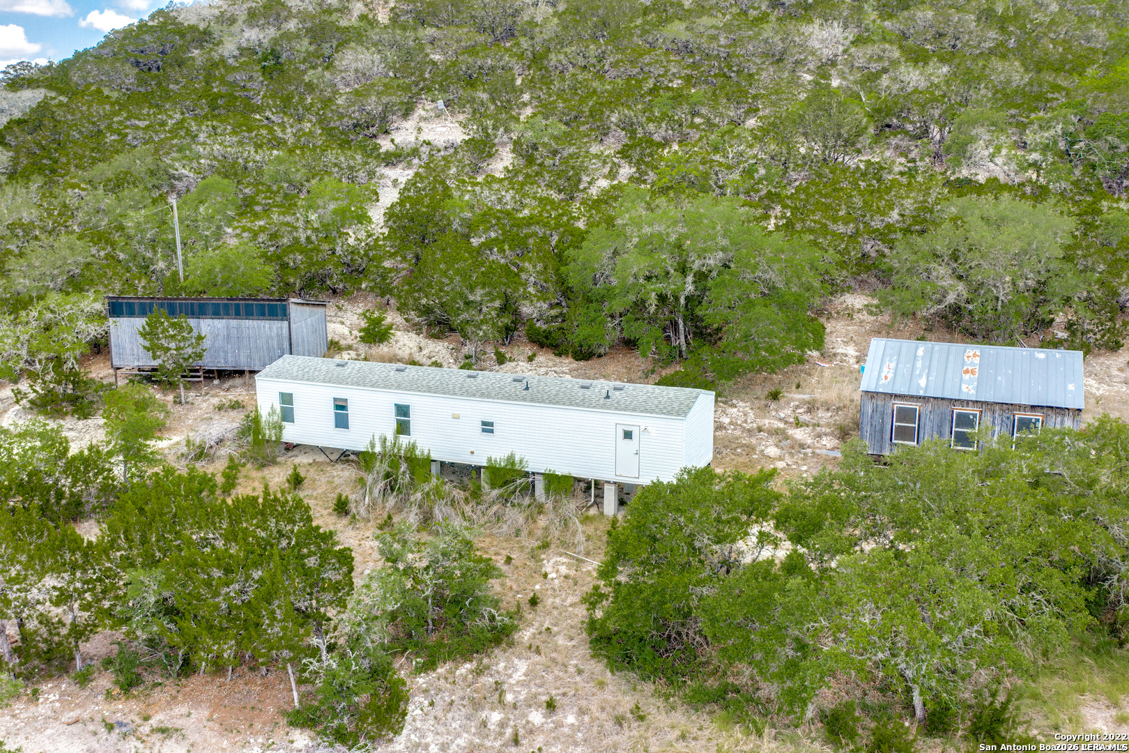 2844 Hidden Valley Road Pipe Creek, TX 78063 - Photo 4 of 30 an aerial view of residential house with outdoor space
