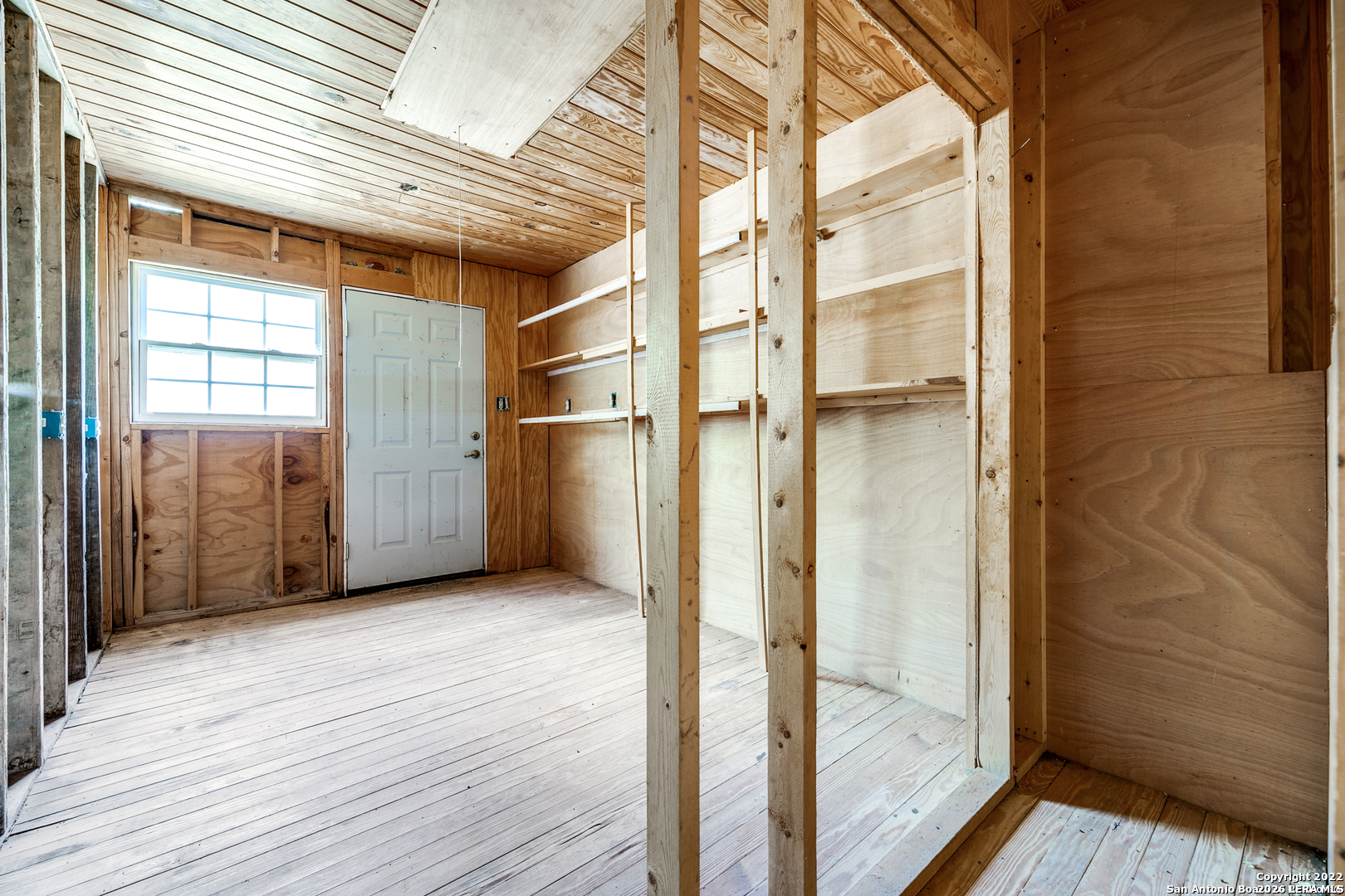 2844 Hidden Valley Road Pipe Creek, TX 78063 - Photo 9 of 30 a view of entryway with wooden floor