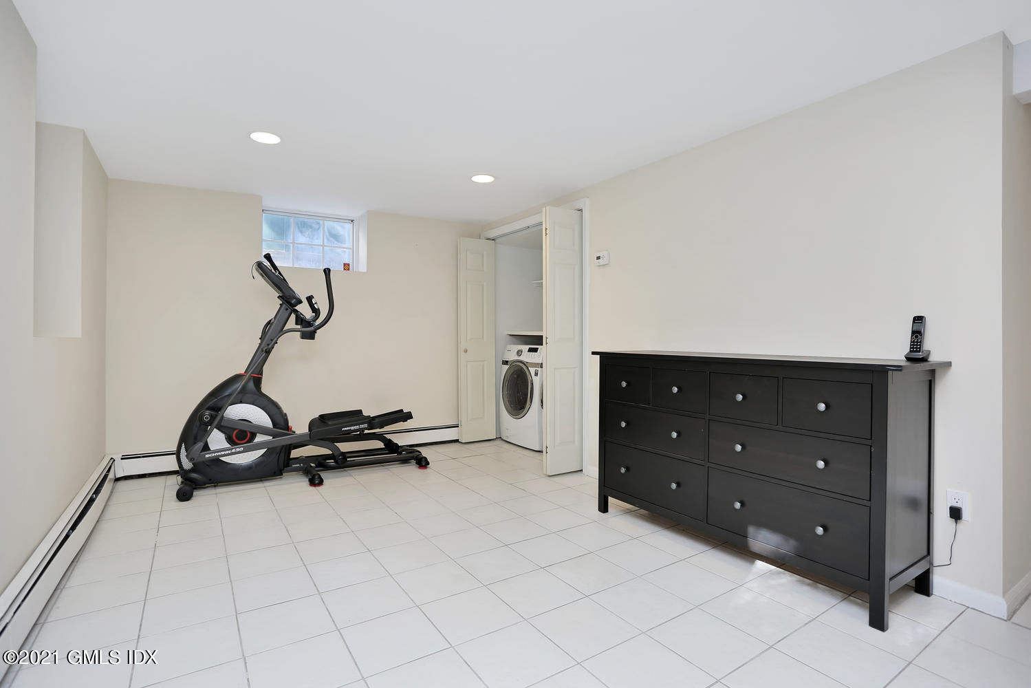 44 Hendrie Avenue Riverside, CT 06878 - Photo 14 of 21 a view of a room with gym equipment