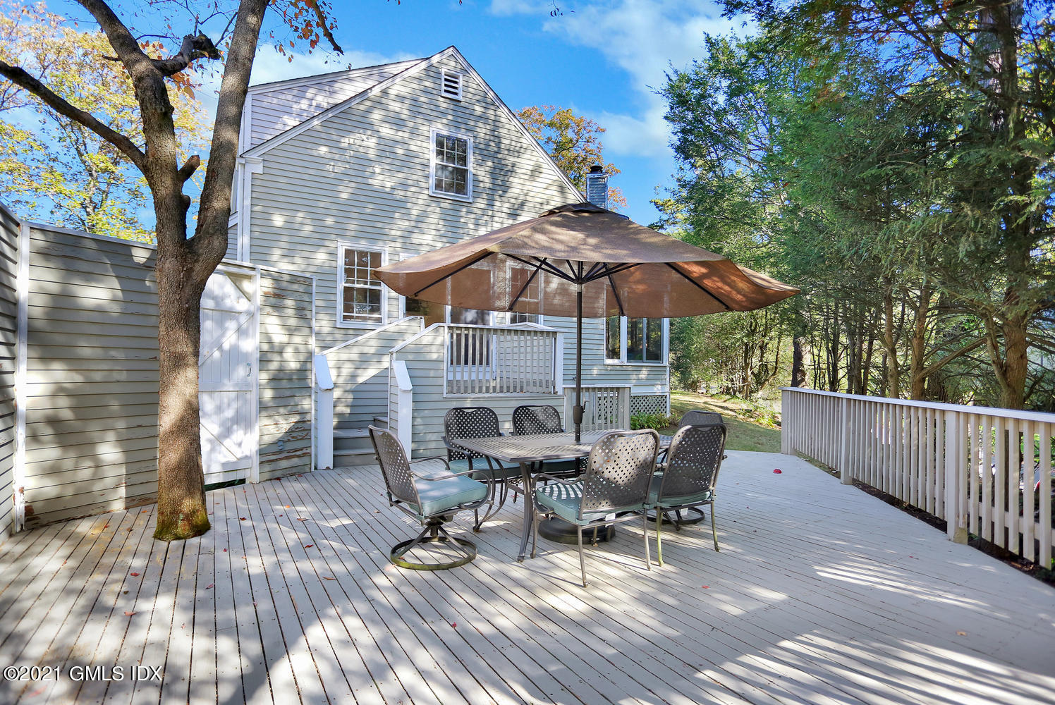 44 Hendrie Avenue Riverside, CT 06878 - Photo 17 of 21 a view of a chairs and table on the wooden floor