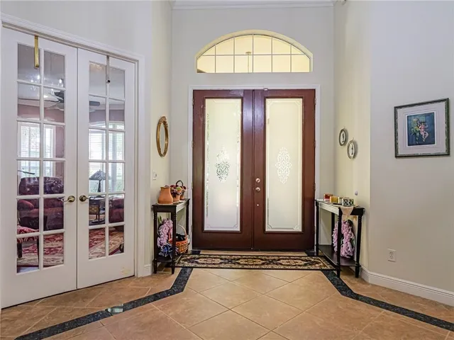 a view of an entryway with wooden door