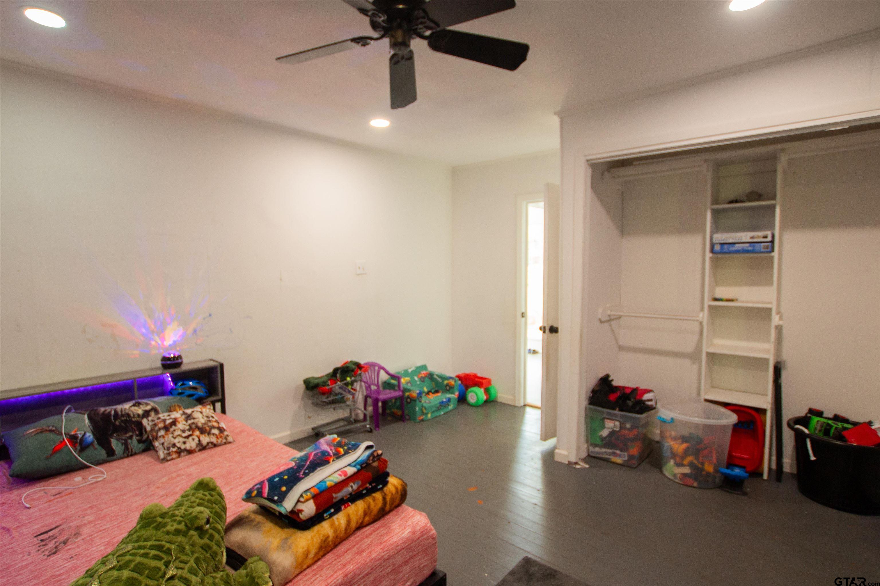 2942 Medlin Road Gilmer, TX 75645 - Photo 19 of 30 a kids room with toys and toys