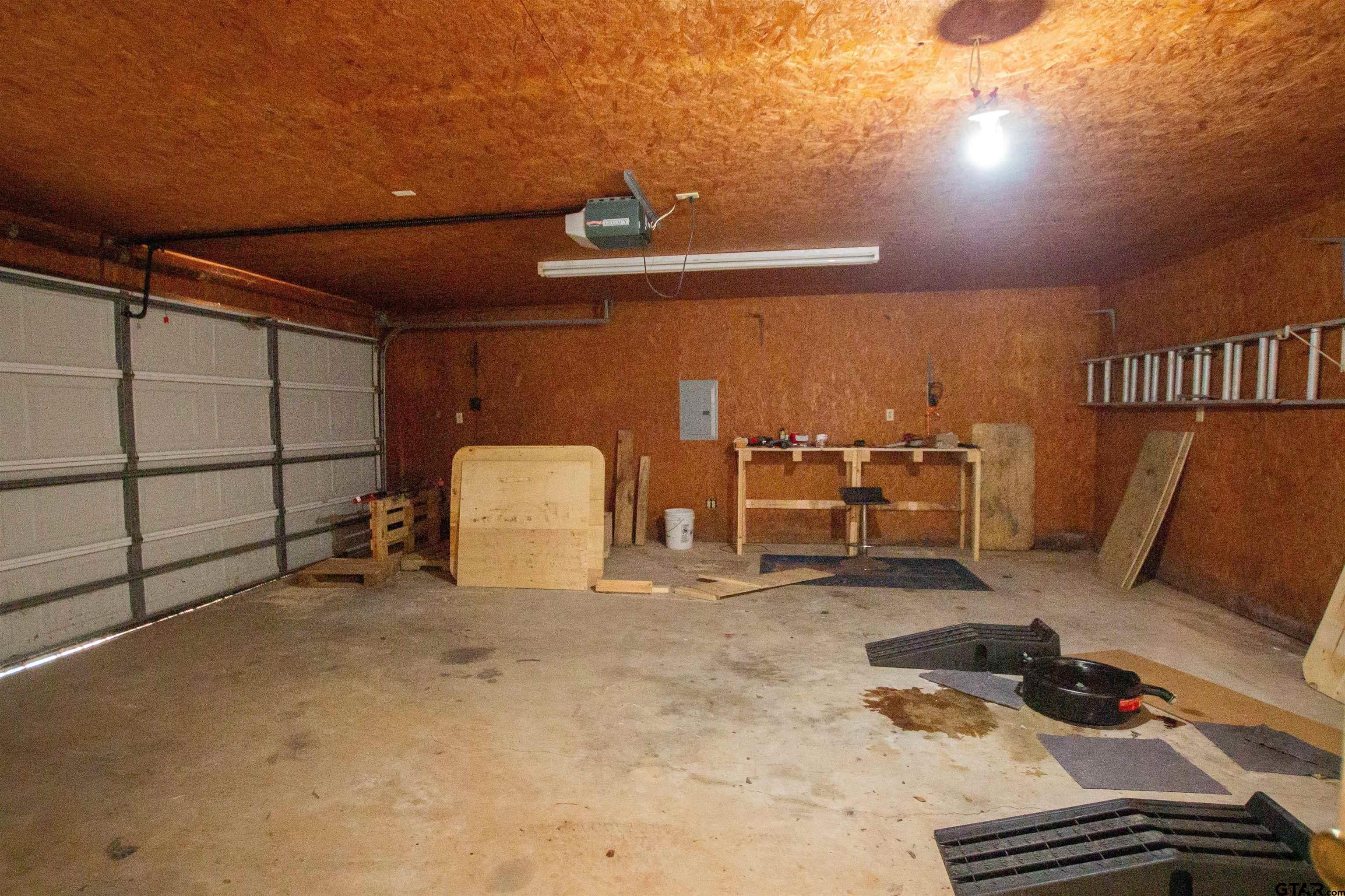 2942 Medlin Road Gilmer, TX 75645 - Photo 29 of 30 a view of a room with furniture and a rug
