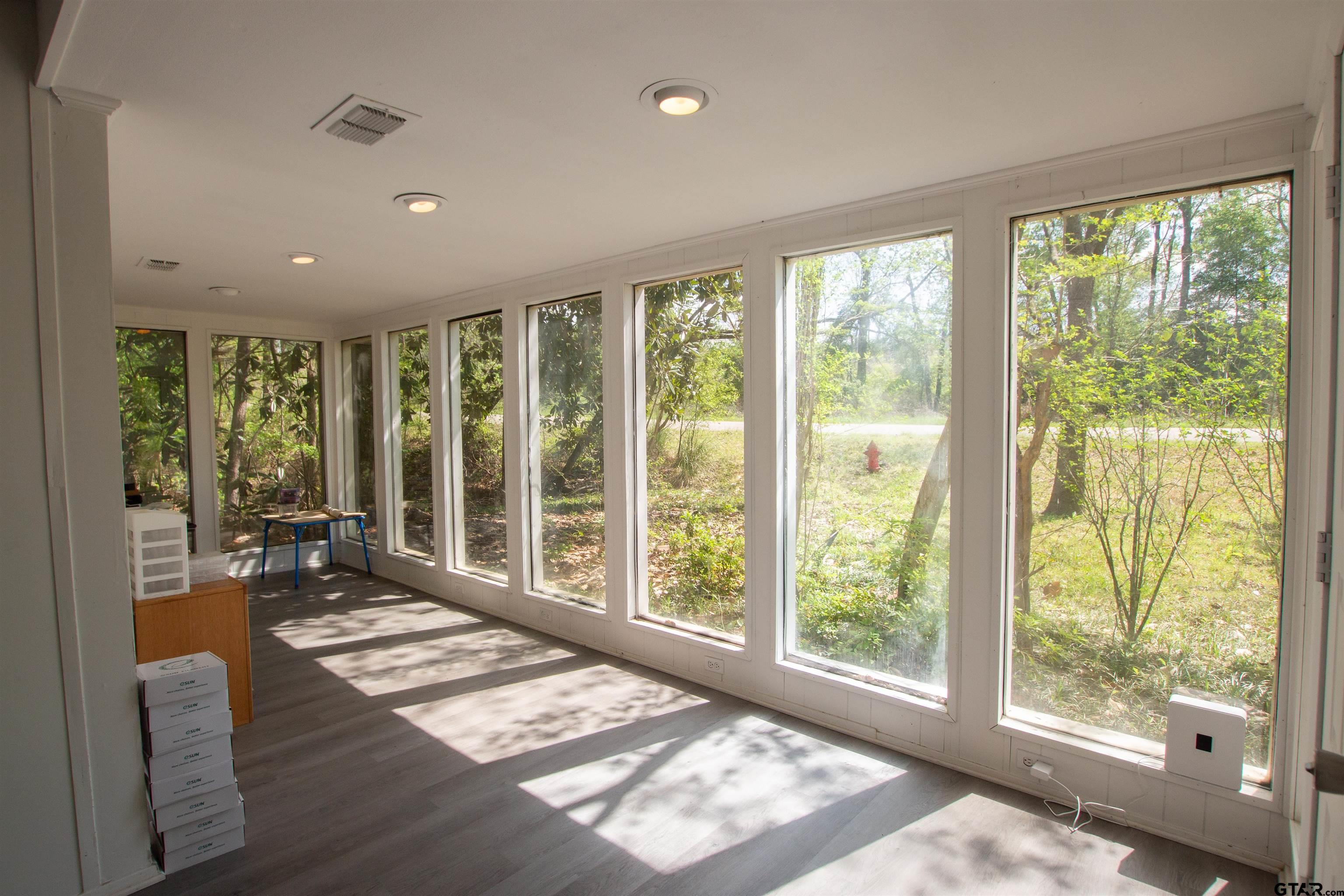 2942 Medlin Road Gilmer, TX 75645 - Photo 8 of 30 a living room with a large window
