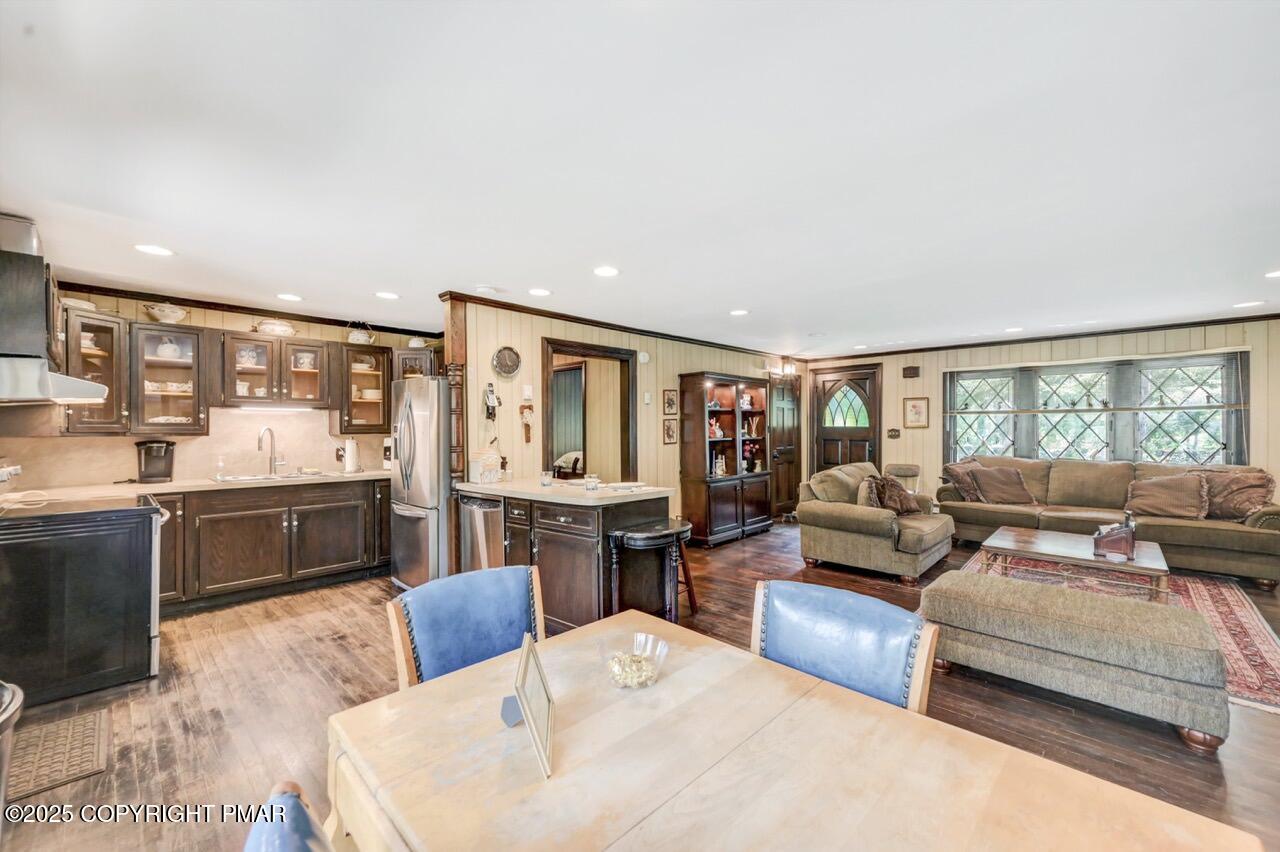 5142 Pine Tree Road Pocono Summit, PA 18346 - Photo 21 of 57 a living room with large couches and kitchen view