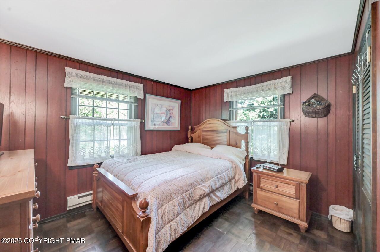 5142 Pine Tree Road Pocono Summit, PA 18346 - Photo 35 of 57 a room with a bed and a window
