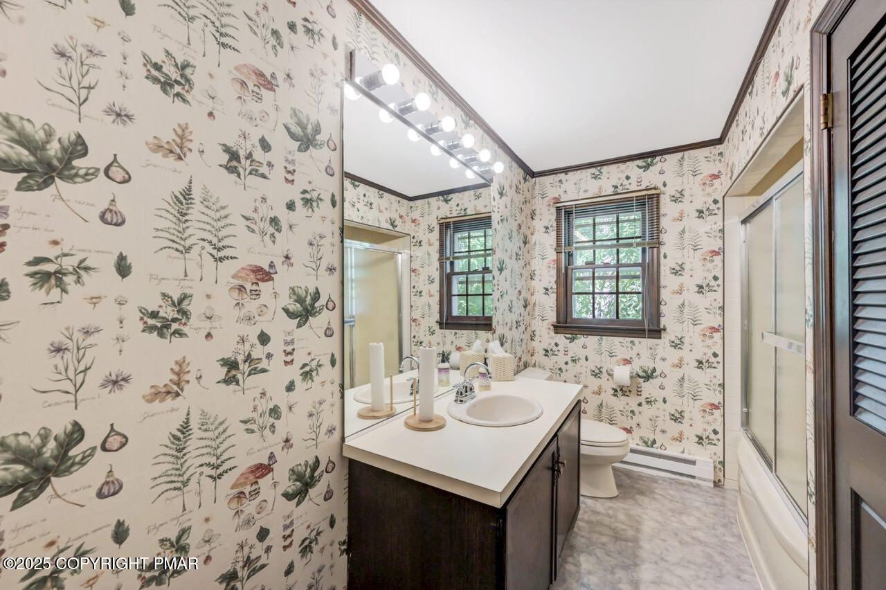 5142 Pine Tree Road Pocono Summit, PA 18346 - Photo 39 of 57 a bathroom with a sink a mirror and a shower