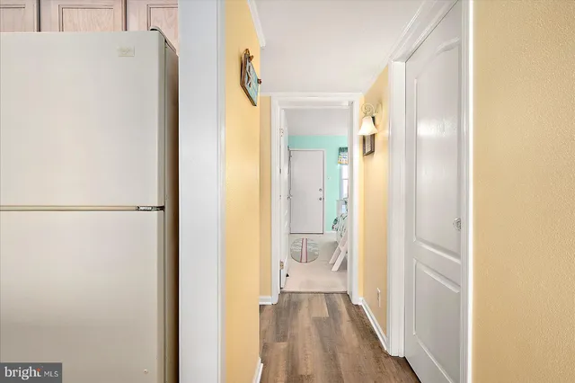 a view of a bathroom from a hallway