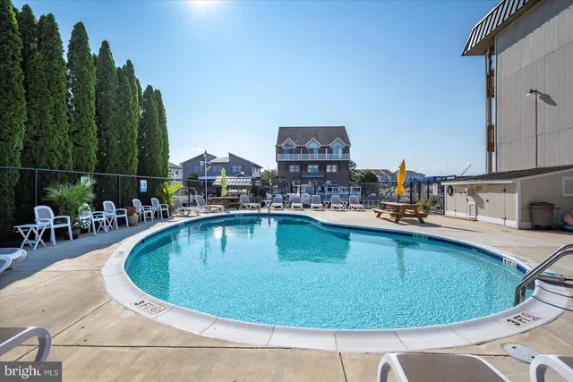 a view of a balcony with two chairs