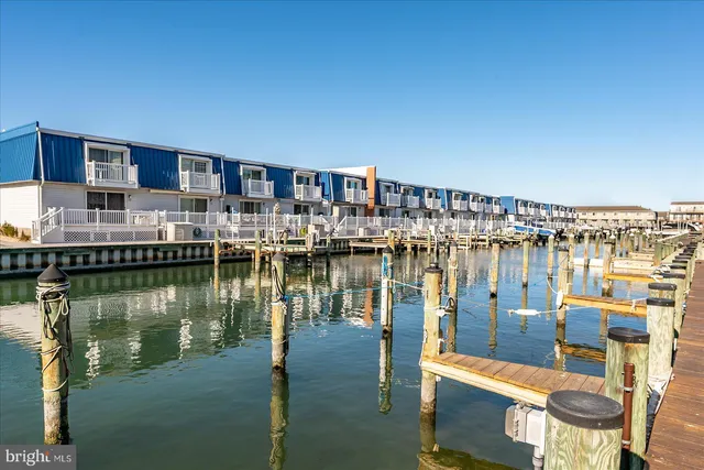 a view of an entryway and wooden floor