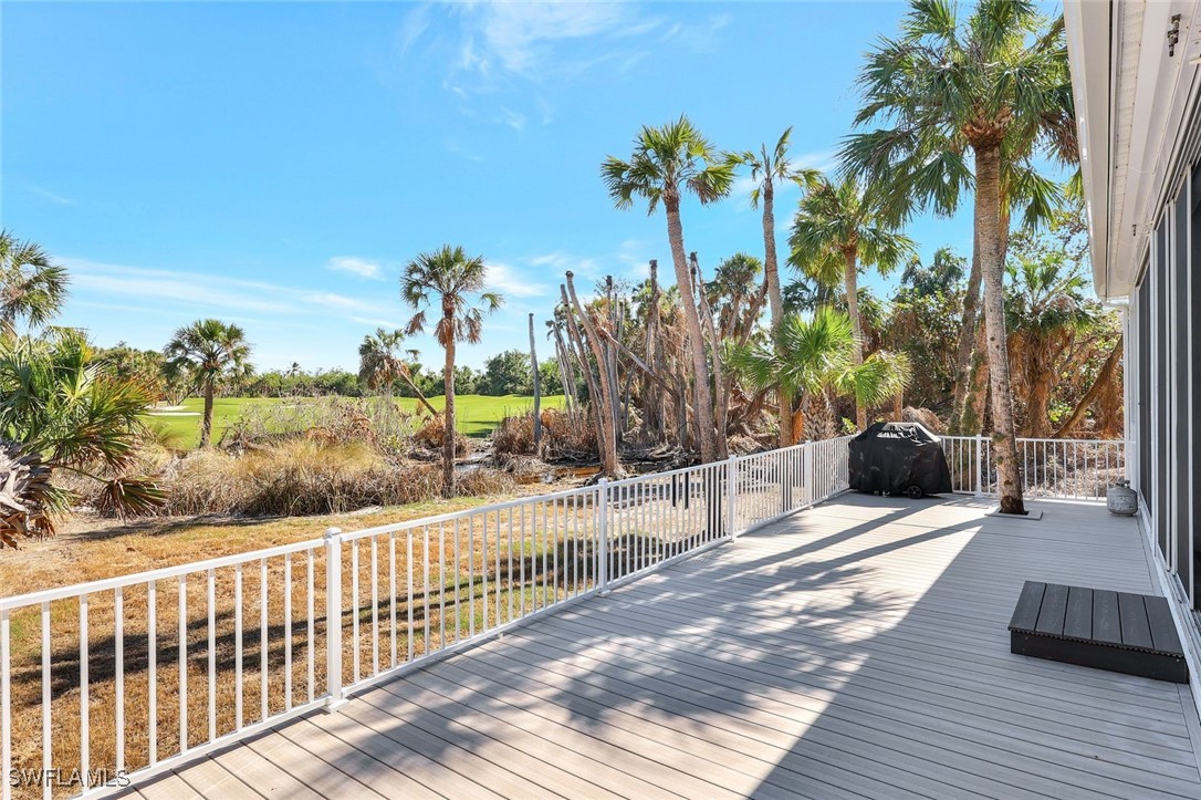 2450 Wulfert Road Sanibel, FL 33957 - Photo 43 of 44 a view of a living room and a porch