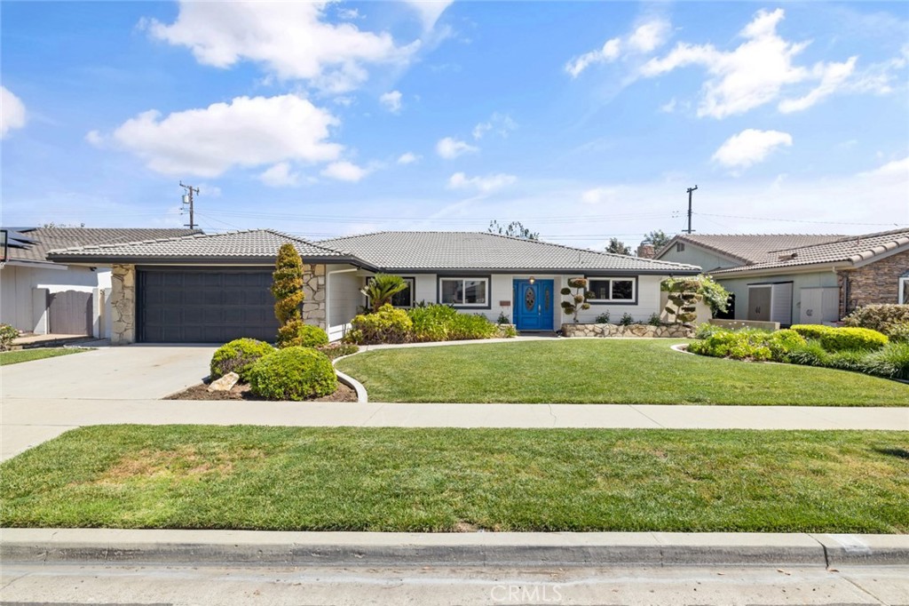 1384 Roxborough Drive Placentia, CA 92870 - Photo 1 of 1 a front view of a house with a yard