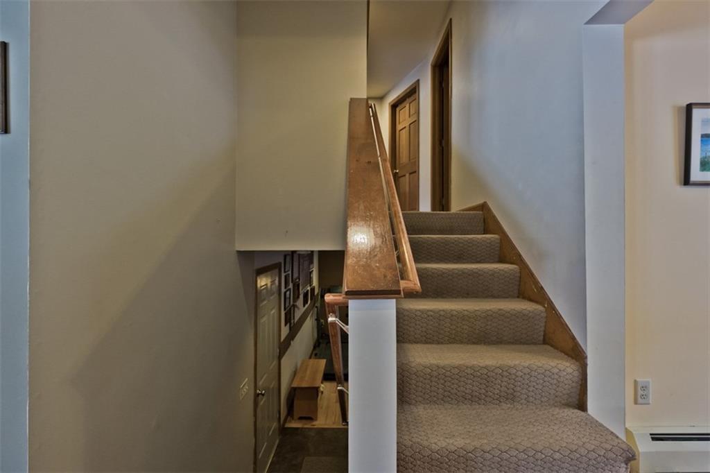 81 Northland Road Waterboro, ME 04061 - Photo 17 of 20 Stairs to the den/garage and up to...