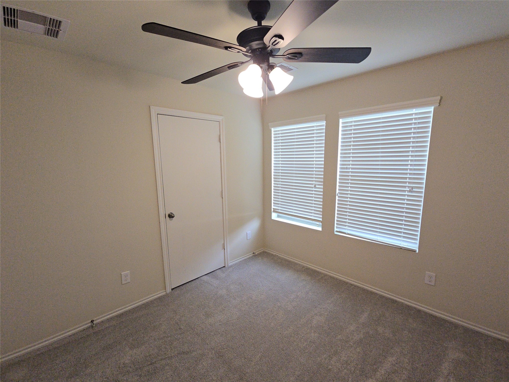 810 Lightningbug Lane Conroe, TX 77301 - Photo 13 of 27 a view of an empty room with a window