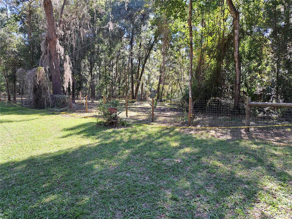 0 Southwest 17th Terrace Gainesville, FL 32608 - Photo 2 of 4 a view of a park with large trees