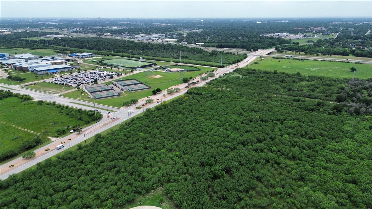 0 Old Reliance Road Bryan, TX 77808 - Photo 4 of 6 a view of a city with lush green forest