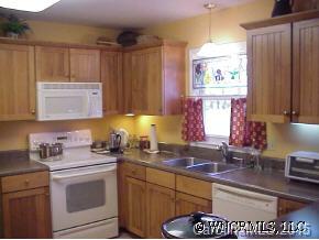 291 Hidden Hill Road Tryon, NC 28782 - Photo 2 of 5 a kitchen with a sink cabinets and window