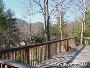 291 Hidden Hill Road Tryon, NC 28782 - Photo 4 of 5 a view of balcony with wooden floor and fence
