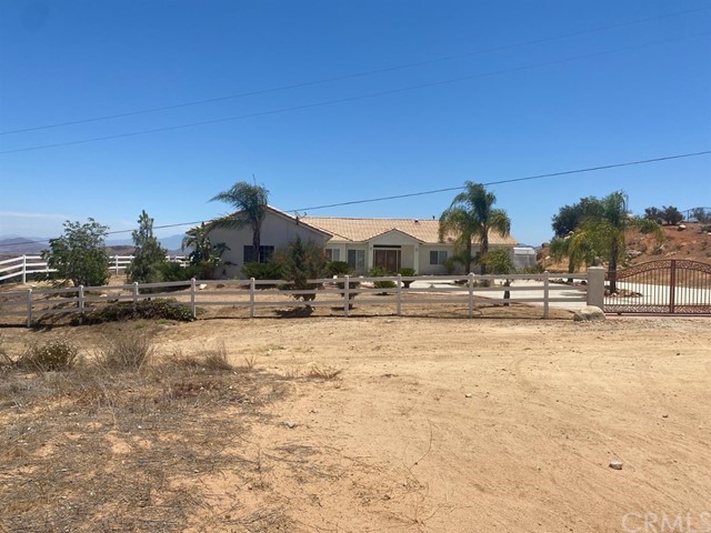 a view of swimming pool with an outdoor seating