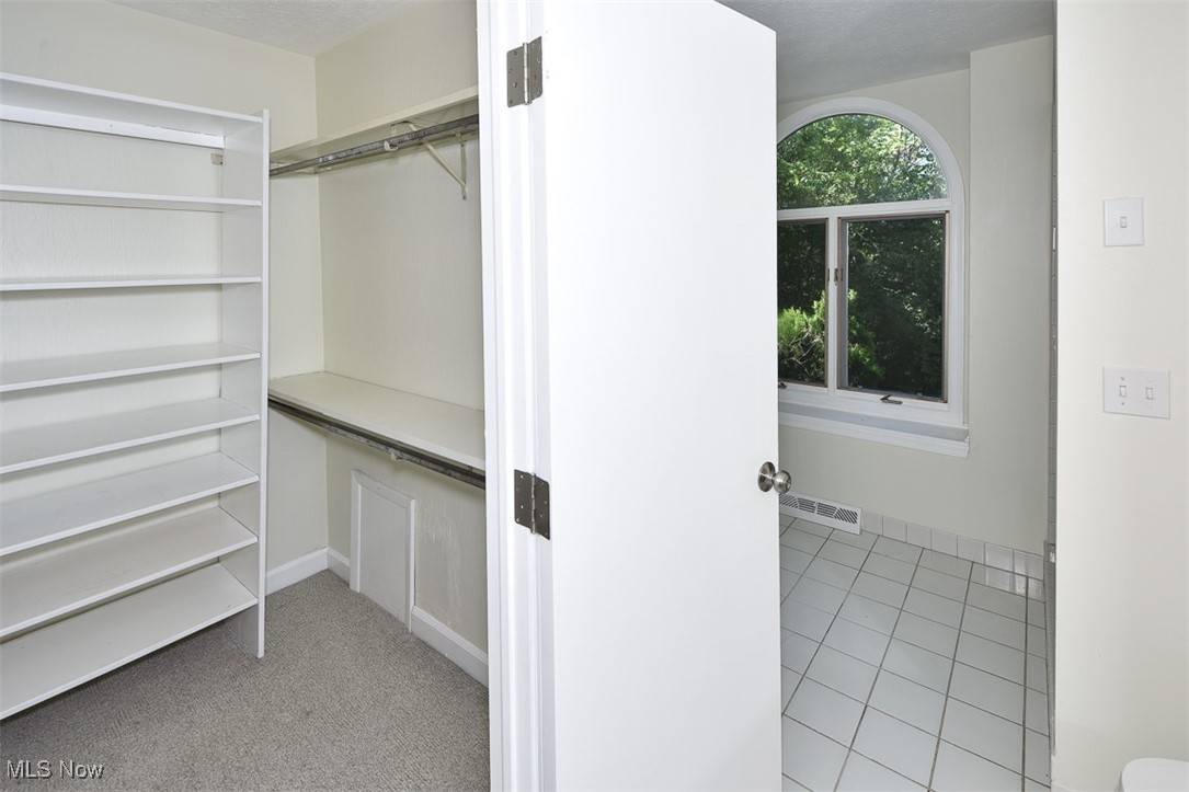 30776 Cedar Road Cleveland, OH 44124 - Photo 21 of 41 Spacious closet with light tile patterned floors