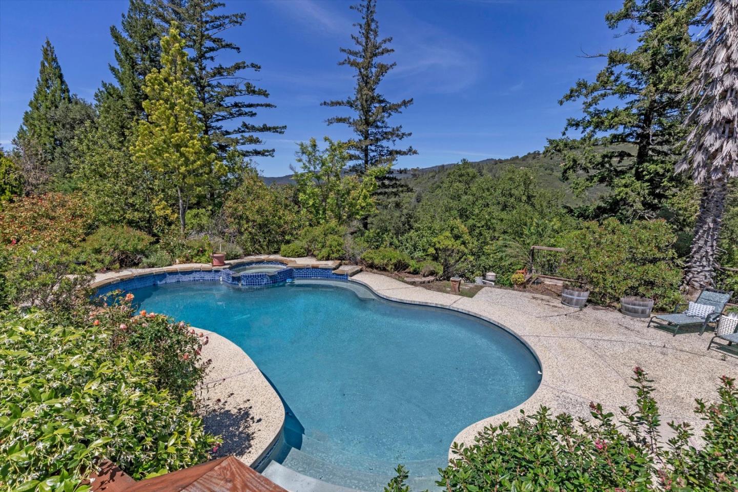 25149 Radonich Road Los Gatos, CA 95033 - Photo 30 of 47 a view of a swimming pool with a yard