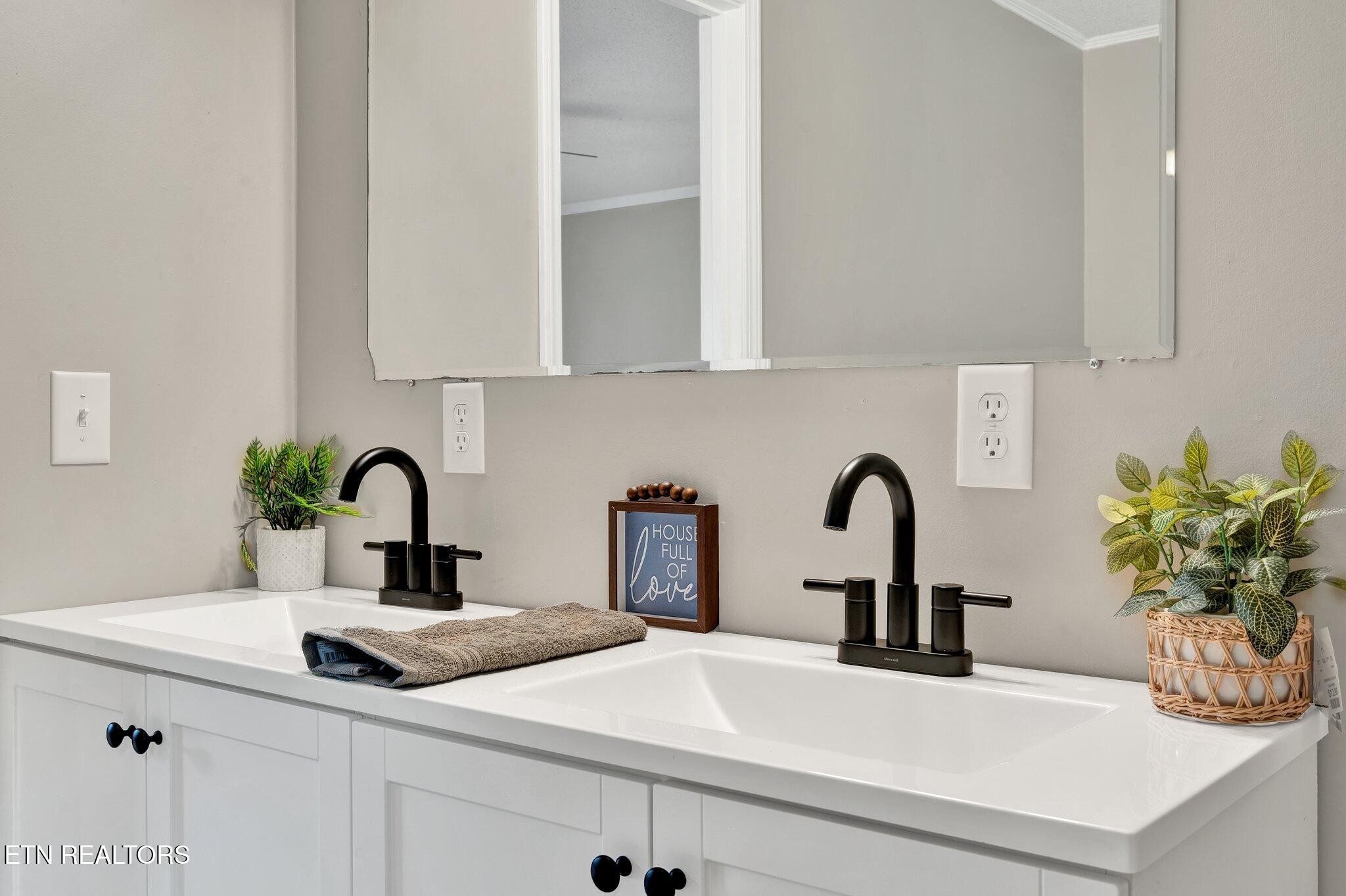 12408 North Nopone Valley Road Decatur, TN 37322 - Photo 15 of 54 a kitchen with sink and white cabinets