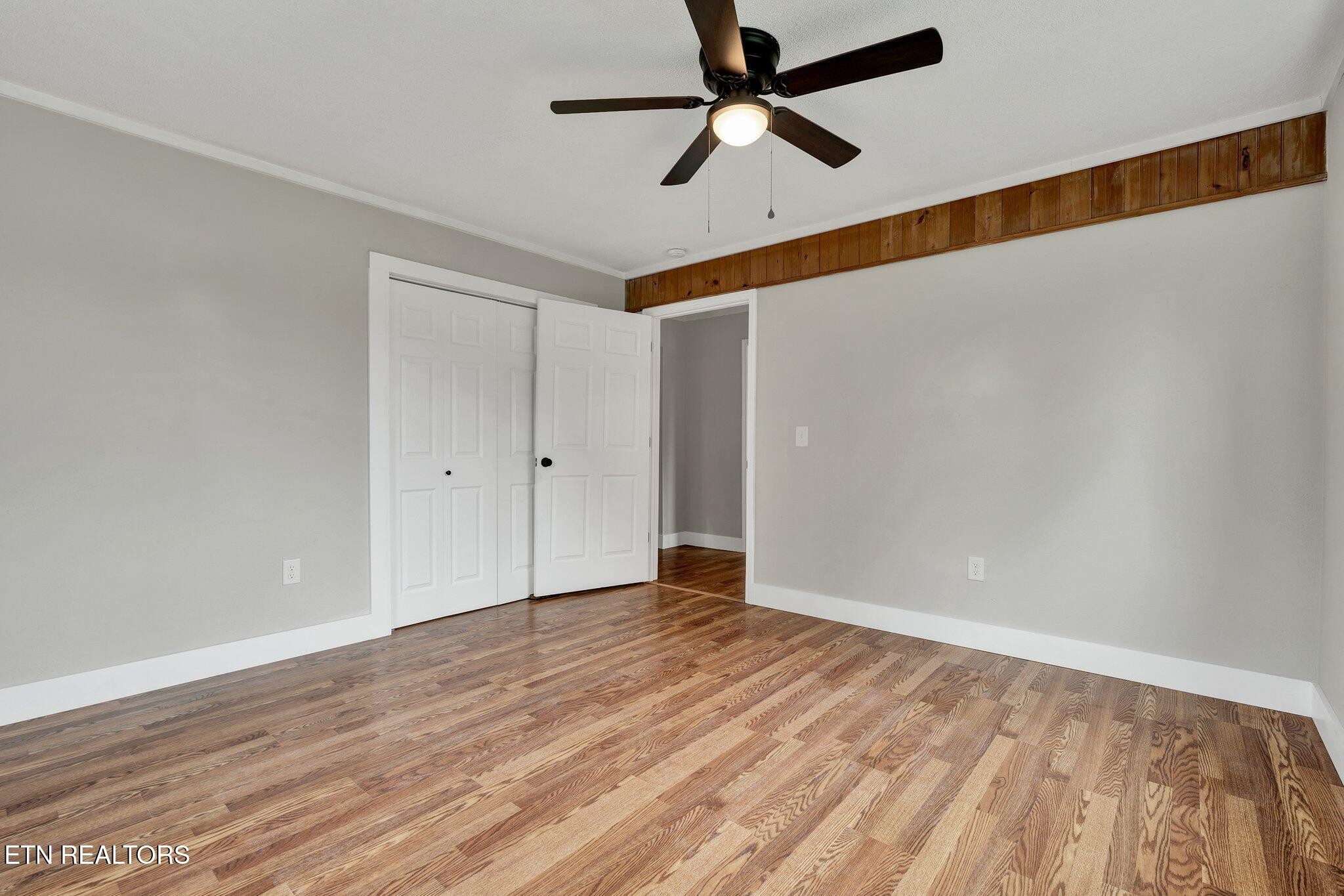 12408 North Nopone Valley Road Decatur, TN 37322 - Photo 31 of 54 wooden floor in an empty room
