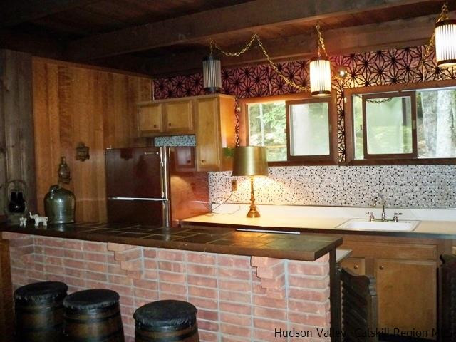 357 Deer Run Road Roxbury, NY 12421 - Photo 14 of 18 a bathroom with a sink and a mirror