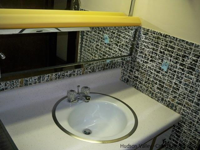 357 Deer Run Road Roxbury, NY 12421 - Photo 16 of 18 a bathroom with a sink and a mirror
