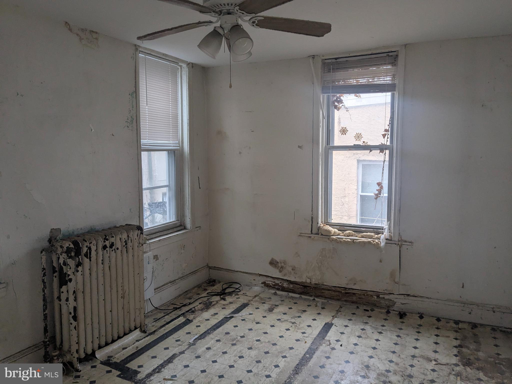 1619 Reed Street Philadelphia, PA 19146 - Photo 15 of 21 a view of an empty room and window