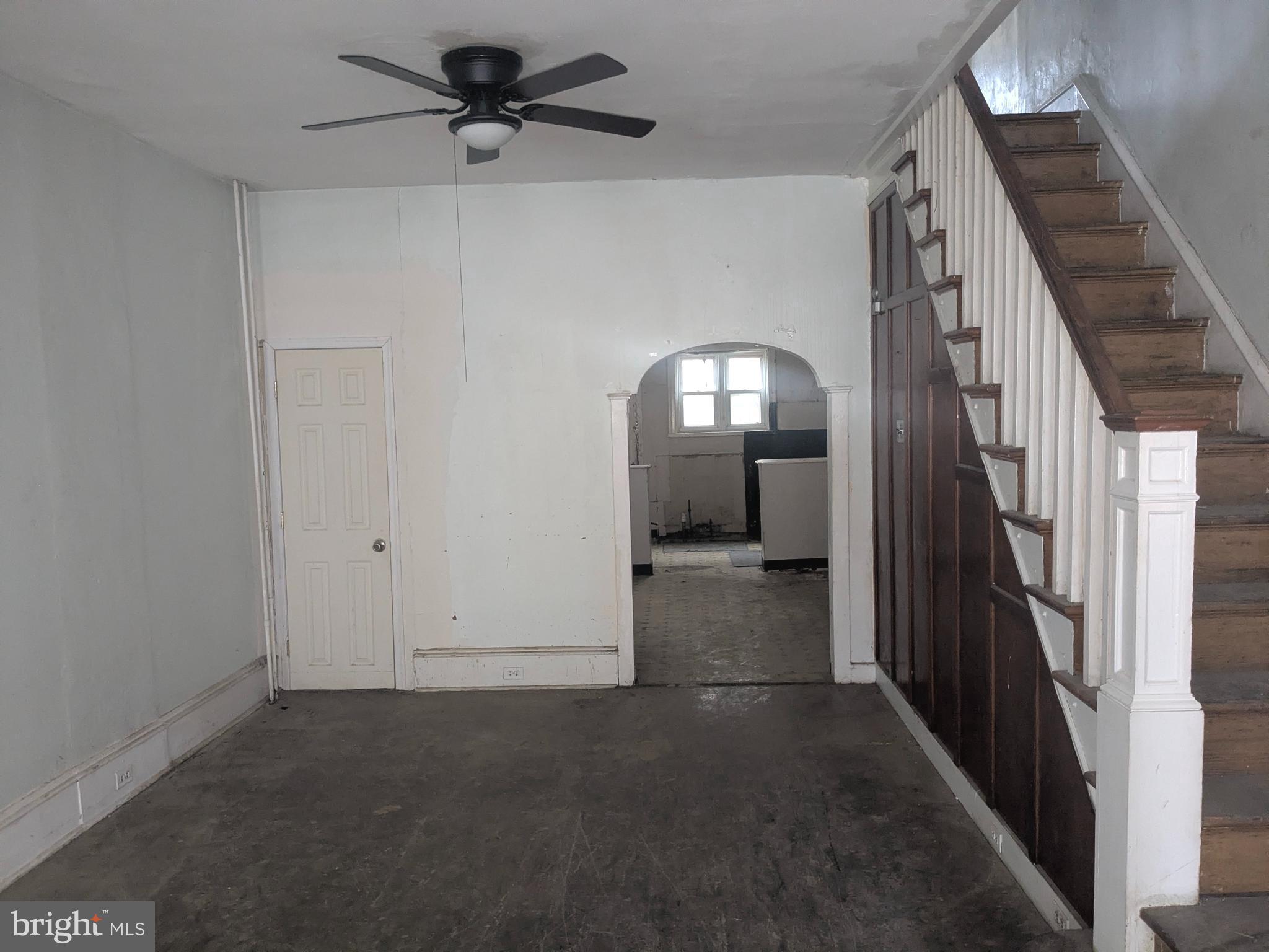 1619 Reed Street Philadelphia, PA 19146 - Photo 4 of 21 a view of a hallway with wooden floor and entryway